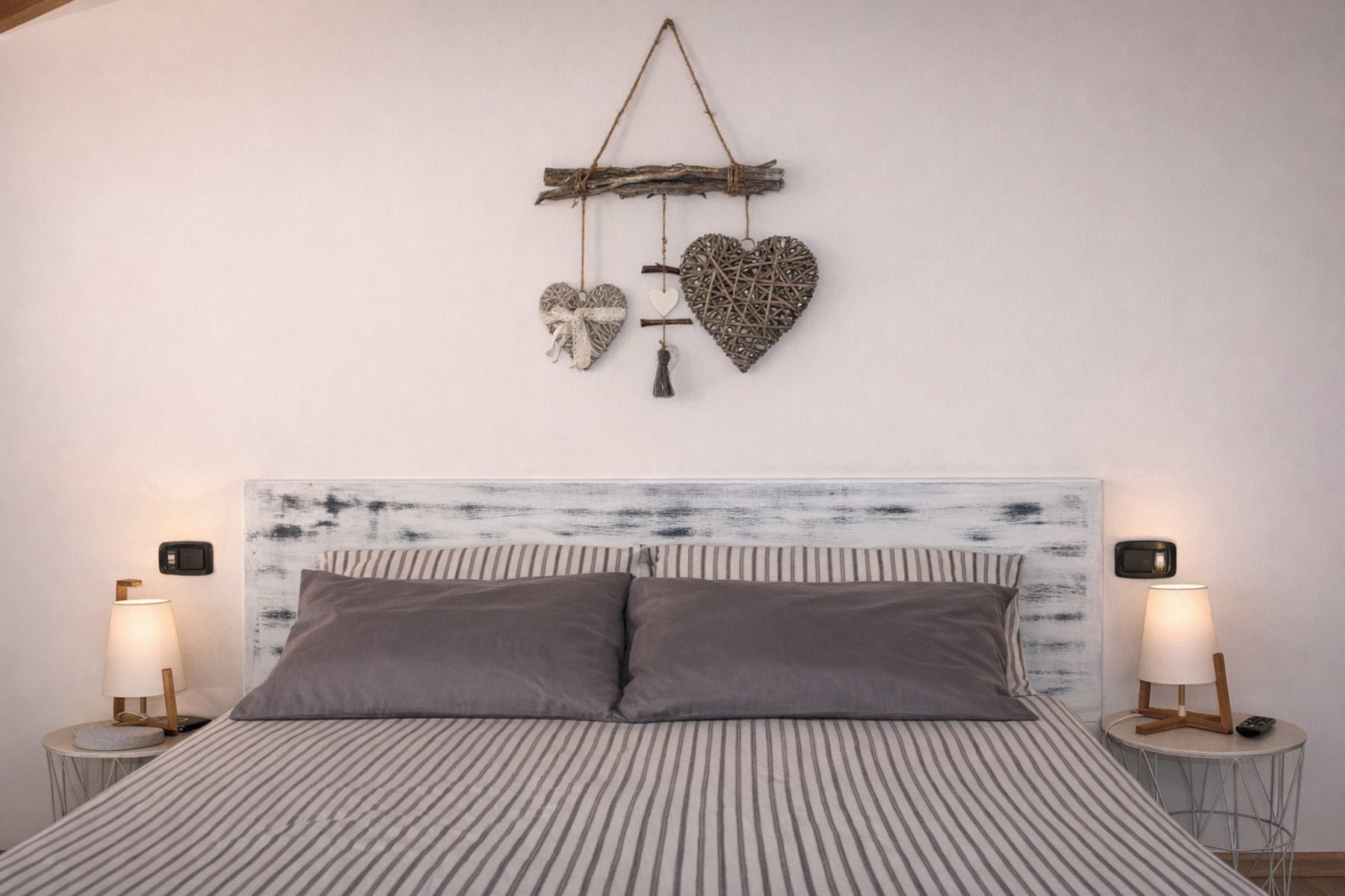 Dettaglio camera matrimoniale elegante